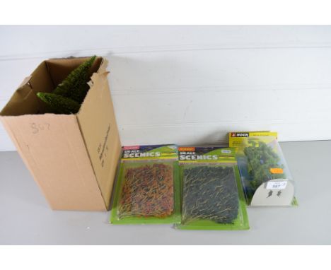 Two Hornby scale Scenix foliage packs together with a boxed tree