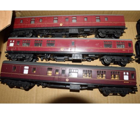 Group of three unboxed 00 gauge coaches to include Triang and Lima in red livery