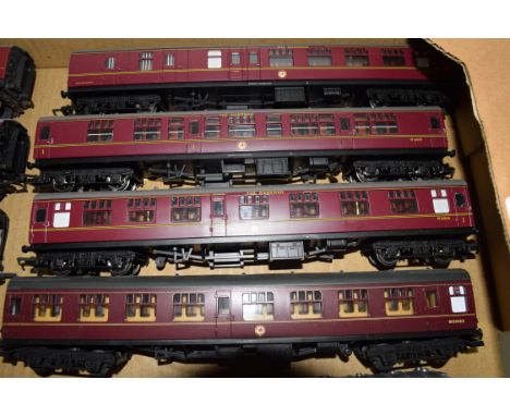 Group of four 00 gauge coaches by Hornby and one Lima in red livery