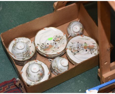 A box containing a Japanese tea set