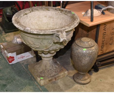 A large composition campana form garden urn; tog. with a granite garden finial