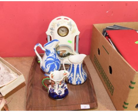 A tray inc. a Staffordshire mantel clock, Gaudy ware jug, 19th century jug etc