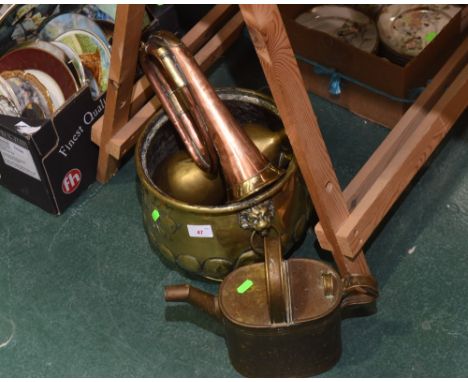 A 19th century copper and brass bugle; tog. with brass jardiniere with ring and lion mask handles etc