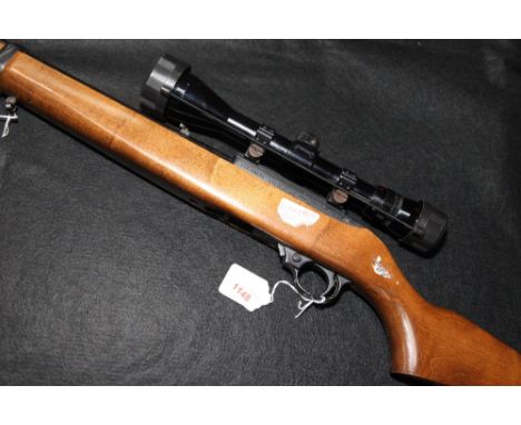 SECTION 1: Number 239-88515, a Ruger model 10/22 carbine in .22 long rifle rim fire, with 3-9x40 scope, complete with threade