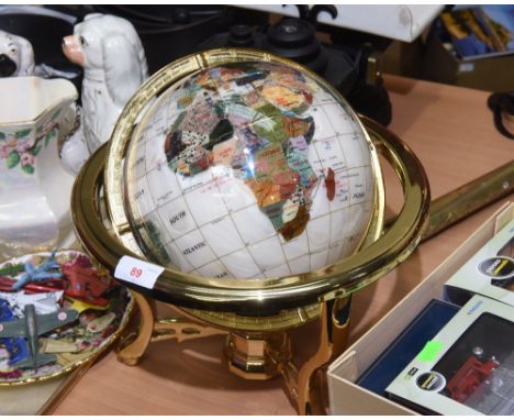 A hardstone inset table globe