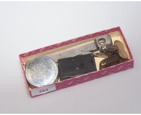 A box containing a cigar cutter, 19th century snuff box, pipe reamers etc