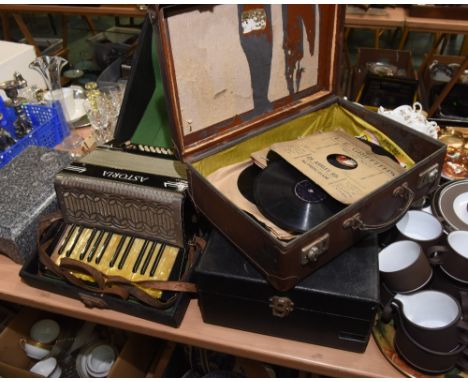 A cased Astoria accordion; tog. with a record player and a quantity of 78s