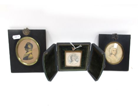 A XIX Century Portrait Miniature Painted on Ivory, (cracked), with a Regency lady, silk border and brass hanging frame, 4.5 x