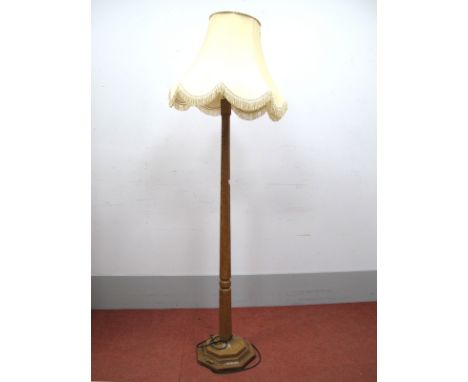 A Robert Thompson 'Mouseman' Oak Standard Lamp, with octagonal column on stepped base, carved mouse signature, together with 