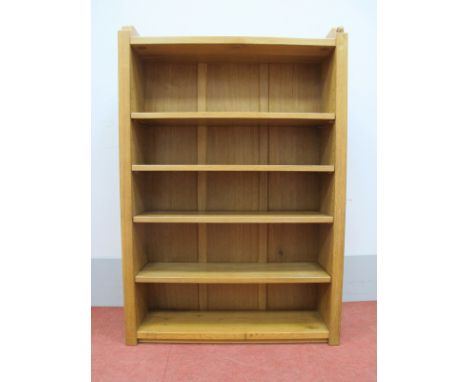 A Robert Thompson 'Mouseman' Oak Open Bookcase, with four adjustable shelves, raised upstand. solid ends and panelled back, c