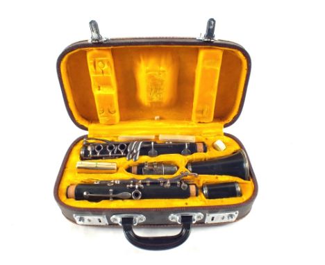 A cased Chinese "Lark" clarinet