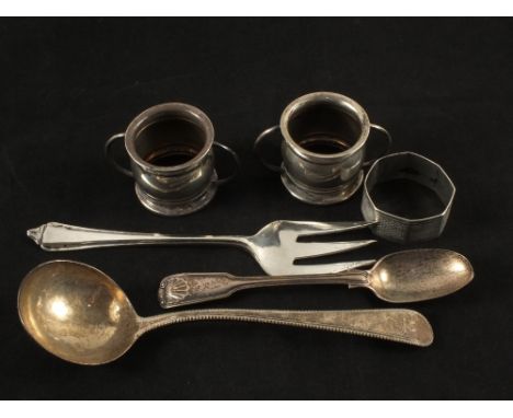 A Silver ladle, fork, teaspoons, serviette ring and two condiments