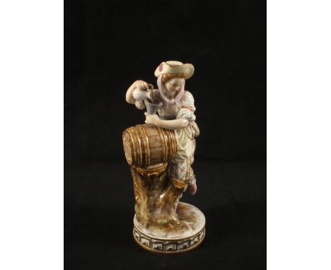 A late 19th Century Meissen figurine of a girl filling a barrel, height 7" (light restoration to hat)