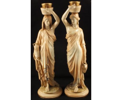 A pair of Royal Worcester blush ivory figures of ladies with Grecian urns, height 20", light finger chip