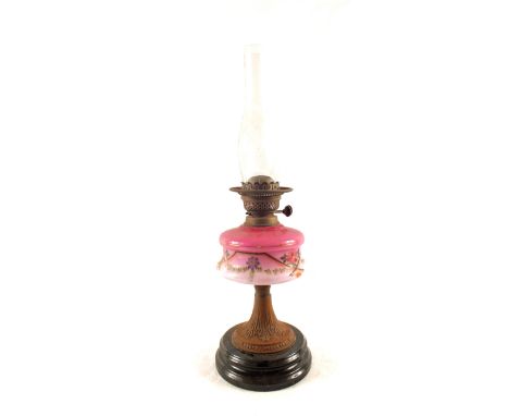 A pink Opal glass and Brass column oil lamp