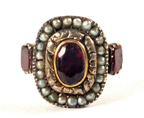 An antique Ruby and Pearl set ring, size approx M