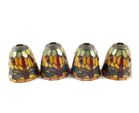 Four Tiffany style stained glass lamp shades decorated with dragonflies