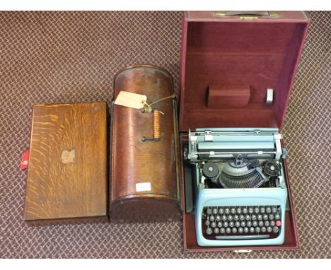 A Singer sewing machine, Brass coal helmet, portable typewriter etc