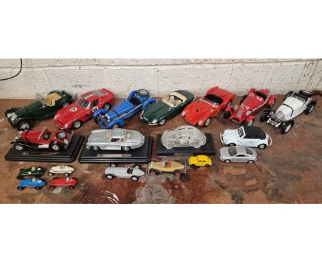 7 x Bburago 1:18 scale model cars and other model cars.Burago