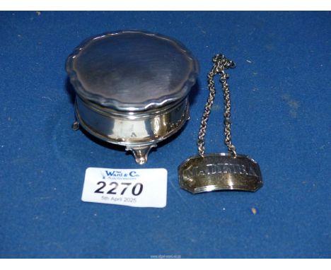 A Silver trinket Pot, Birmingham 1926, 2 1/2" diameter x 1 1/2" tall, together with a Madeira silver decanter label (82 gms. 