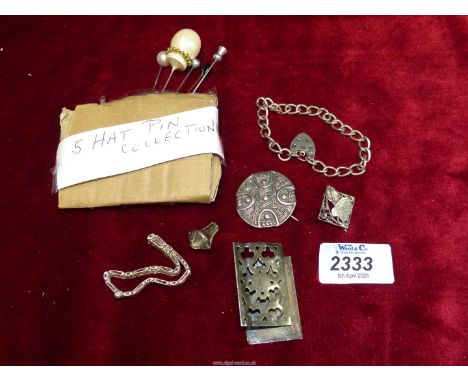 A small quantity of jewellery including a silver bracelet with heart padlock, silver Celtic brooch, hat pins, scrap silver et