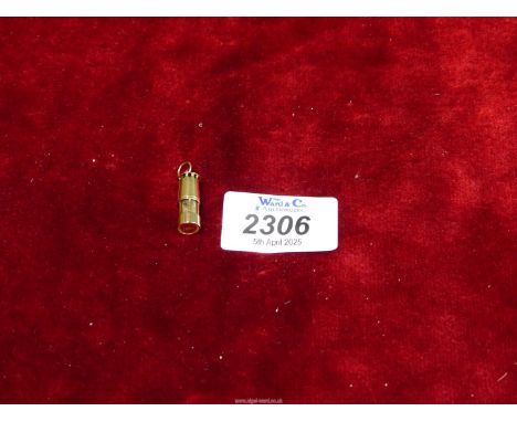A 9ct gold Miners lamp charm.