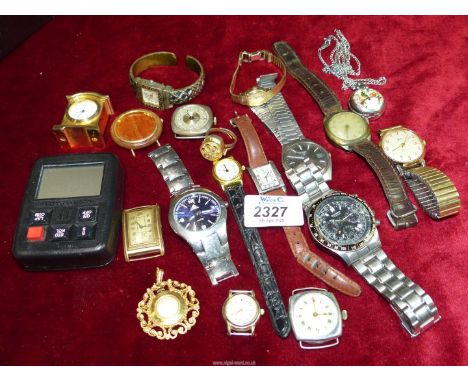 A box of watches and a stopwatch.