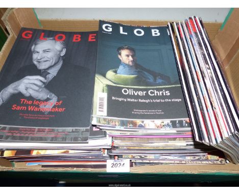 A large quantity of Globe Magazines.