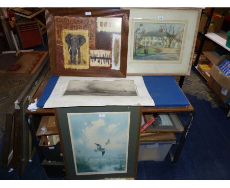 A framed and mounted Watercolour of a house and garden, signed lower left Marian M. Combes, along with a Limited edition prin
