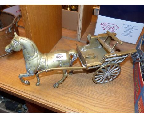 A model pony and trap (one light loose but present).