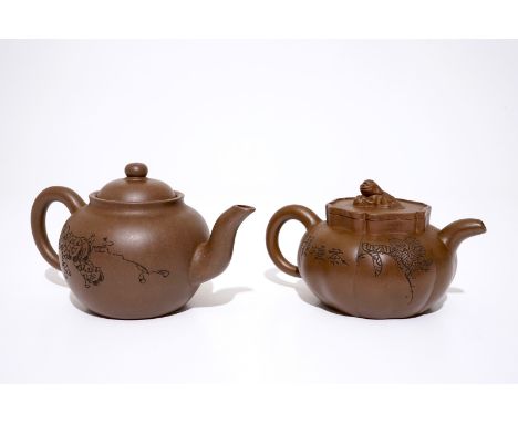 Two Chinese dark Yixing stoneware teapots and covers, 19/20th C.  L.: 21,5 cm - H.: 11,5 cm  (the round teapot)L.: 19 cm - H.