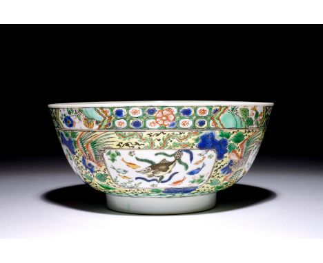 A Chinese famille verte bowl with fish and phoenixes, Kangxi  Dia.: 19 cm - H.: 9 cm  Condition reports and high resolution p