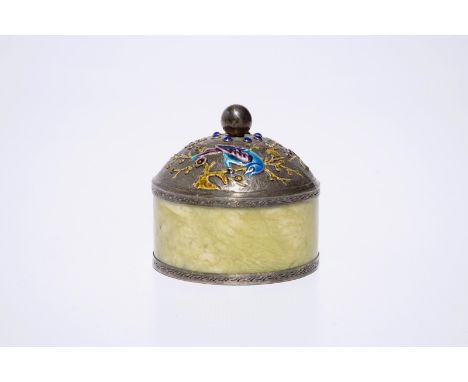 A Chinese enameled silver and jade cylindrical box, ca. 1900  Dia.: 6 cm - H.: 6 cm  Marked on the base "SILVER", next to two