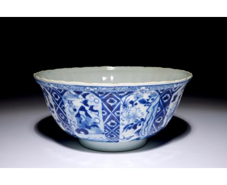 A Chinese blue and white Kangxi-style bowl, 19th C.  Dia.: 19,5 cm - H.: 9 cm  Condition reports and high resolution pictures