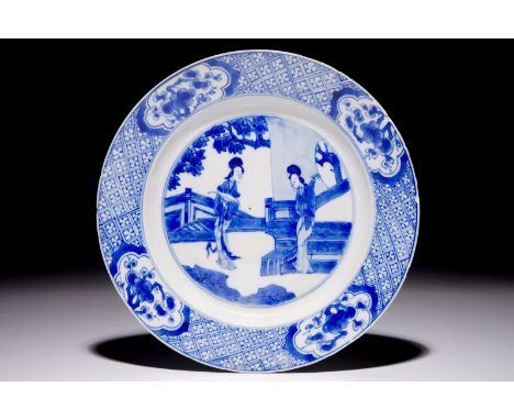 A Chinese blue and white plate with "Long Elizas" in the garden, Kangxi  Dia.: 21 cm  Condition reports and high resolution p