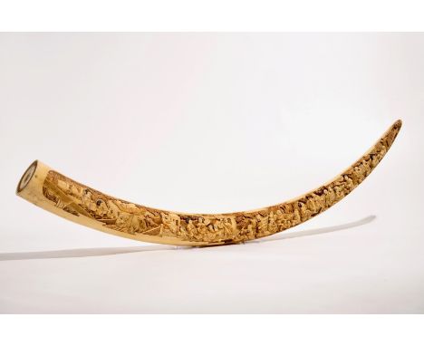 A large Chinese carved ivory tusk, early 20th C.  L.: 165 cm (the curve)L.: 149 cm (the straight line)  Condition reports and
