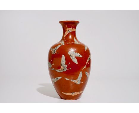 A Chinese coral-ground vase with butterflies, Qianlong mark, 19/20th C.  H.: 33 cm  Condition reports and high resolution pic