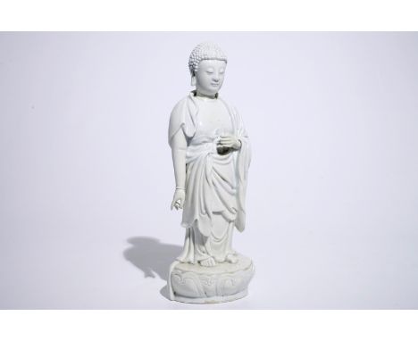 A Chinese Dehua blanc de Chine model of a standing Buddha, impressed mark on the back, Kangxi  H.: 33,5 cm  Condition reports