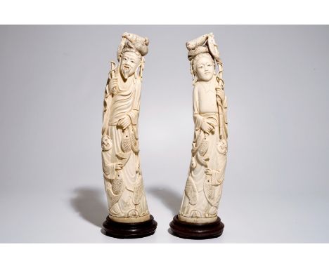 A pair of tall Chinese ivory figures of a fisherman and woman, 19/20th C.  Dim.: 43 x 13 x 12,5 cm (incl. stand)  Condition r
