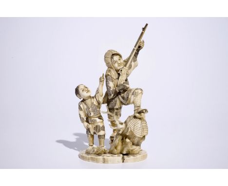A Japanese ivory okimono of a hunter and his son, Meiji, late 19th C., signed  Dim.: 28 (h) x 16 x 11 cm  Condition reports a