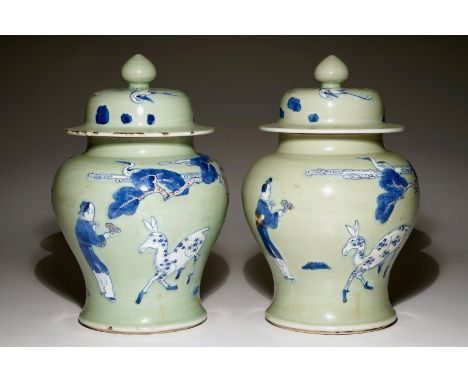 A pair of Chinese celadon, copper-red and underglaze blue vases and covers, Kangxi  H.: 32 cm (incl. cover)  Condition report