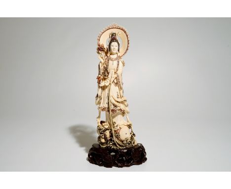 A Japanese ivory model of Guanyin on a carp, Taisho, ca. 1930, signed  Dim.: 33 x 14,5 x 9 cm  Condition reports and high res
