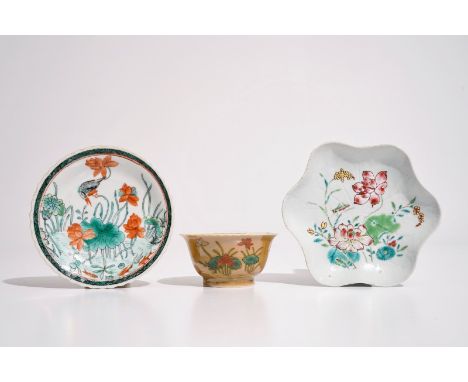A Chinese famille verte cafe au lait ground cup and saucer, Kangxi, together with a famille rose teapot stand, Yongzheng  Dia