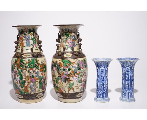 A pair of Chinese blue and white Kangxi vases and a pair of famille rose Nanking vases, 19th C.  H.: 35 cm (the famille rose 