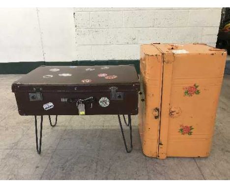 A vintage leather suitcase and a painted tin trunk 