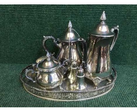 A plated four piece tea service on gallery tray and two similar sifters 