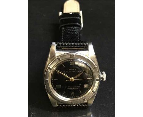 A vintage Rolex bubble back Oyster stainless steel wrist watch, numbered 458722.
