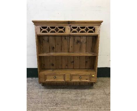 A pine wall shelf fitted two drawers 