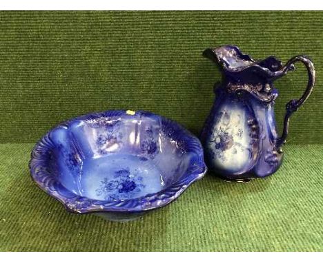 A blue glazed toilet jug and basin set 