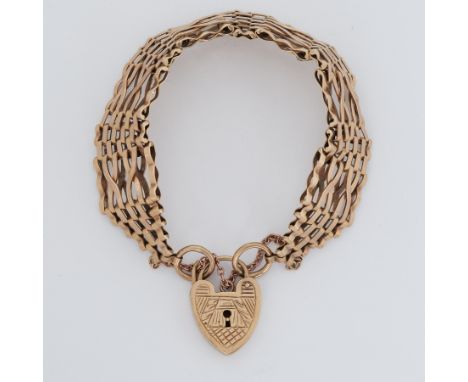 A 9ct yellow gold gate bracelet with heart padlock, 24.86gm.